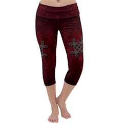 Decorative Celtic Knot On Dark Vintage Background Capri Yoga Leggings by FantasyWorld7